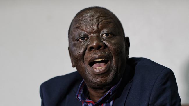 Zimbabwe opposition leader Morgan Tsvangirai speaks to the Associated Press after giving a press conference at his home in Harare, Zimbabwe Thursday, Nov. 16, 2017. Tsvangirai said President Robert Mugabe must resign and called for a negotiated, inclusive transitional mechanism as well as comprehensive reforms before elections. (AP Photo/Ben Curtis)