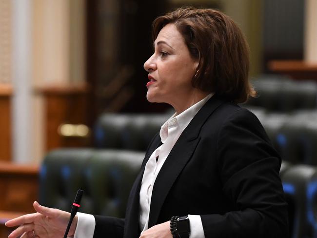 Queensland Deputy Premier and Treasurer Jackie Trad addresses a reduced chamber, due to social distancing measures, during Question Time at Queensland Parliament in Brisbane, Wednesday, April 22, 2020. Queensland has recorded no new cases of coronavirus in the past 24 hours. (AAP Image/Dan Peled) NO ARCHIVING