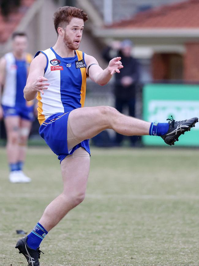 Liam Wanders kicks nicely for Macleod. Picture: George Salpigtidis