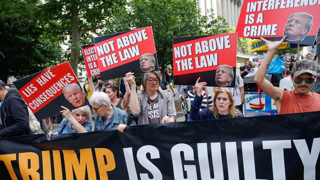 Anti-Trump protesters celebrate after his conviction. Picture: AFP.