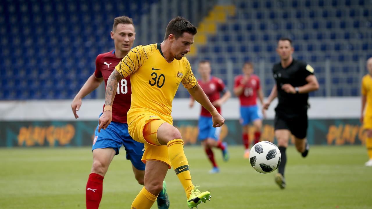 Socceroos Jamie Maclaren controls the ball