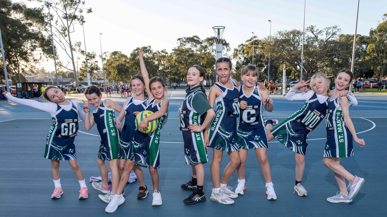 St Mary’s Navy under-11 netball team pull their funniest faces.