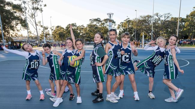 St Mary’s Navy under-11 netball team pull their funniest faces.