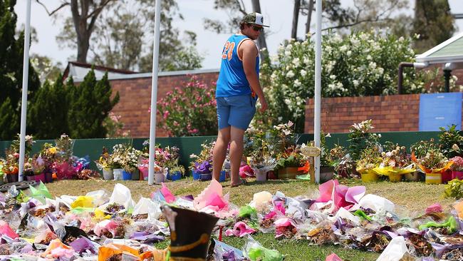 Michael Bemrose from the Gold Coast at the memorial site out the front of Dreamworld.