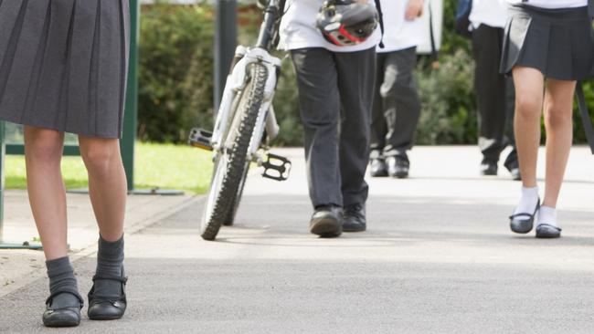 A man took photos of a group of schoolkids near their Blackburn school earlier this month.