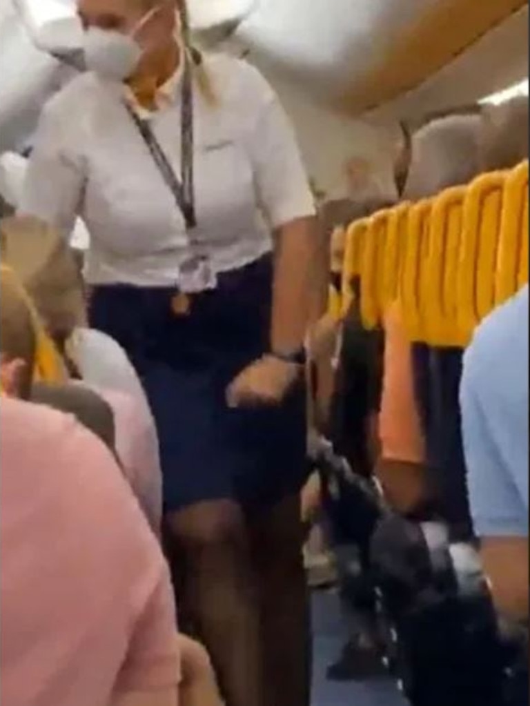 Staff advised other passengers to stay in their seats. Picture: Twitter/@fionnmurphy10