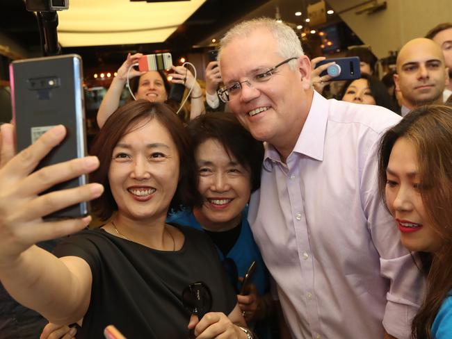 Mr Morrison stops for a selfie during a visit to Strathfield Square in Sydney. Picture: Gary Ramage