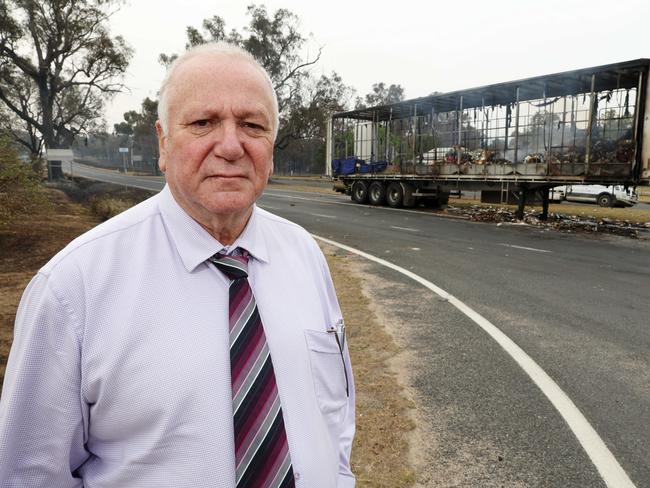 Mayor Vic Pennisi infront of a burning truck in Wallangarra in 2023. Picture: Liam Kidston