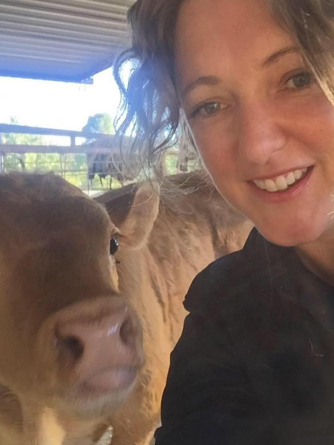 Sarah Hawthorn with a calf she raised.