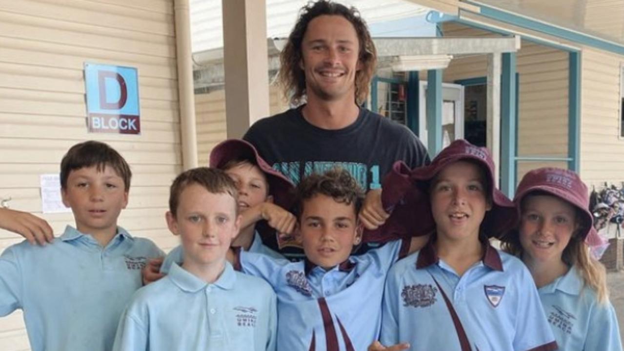 Cronulla star Nicho Hynes at his old school on the Central Coast.