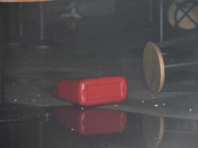 A jerry can could be seen discarded on the floor of the play centre. Picture: Andrew Henshaw