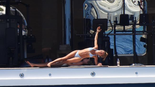 Planking on the yacht. Picture: Papadakis Press/MEGA