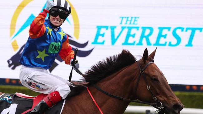 Craig Williams celebrates his The Everest victory aboard Bella Nipotina. Picture: AFP