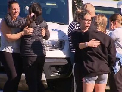 People gather at the scene of the fatal hit and run. Picture: 9 News