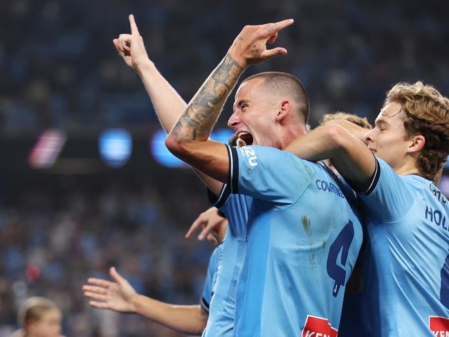 SYDNEY, AUSTRALIA - NOVEMBER 23: Jaiden Kucharski of Sydney FC celebrates scoring a goal with team mates during the round five A-League Men match between Sydney FC and Western Sydney Wanderers at Allianz Stadium, on November 23, 2024, in Sydney, Australia. (Photo by Mark Metcalfe/Getty Images)