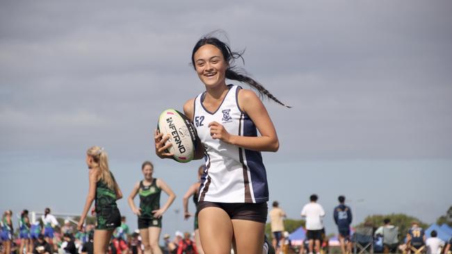 Amielia Chadburn from the under 18s is all smiles.