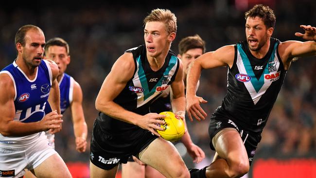 Todd Marshall of the Power runs with the ball during the round match against North Melbourne. Picture: Getty Images