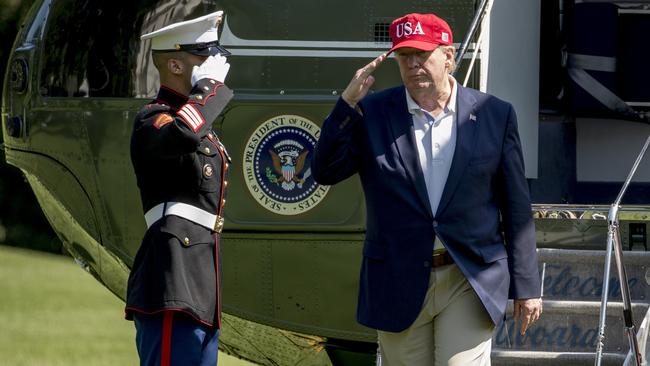 Par for the course … Donald Trump arrives at the White House after a trip from Trump National Golf Club in Sterling, Virginia. Picture: AP