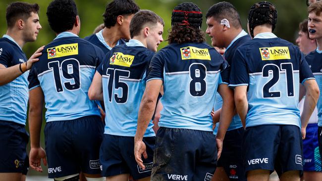 The young Waratahs during their match with the Reds. Pic: Kev Nagle.