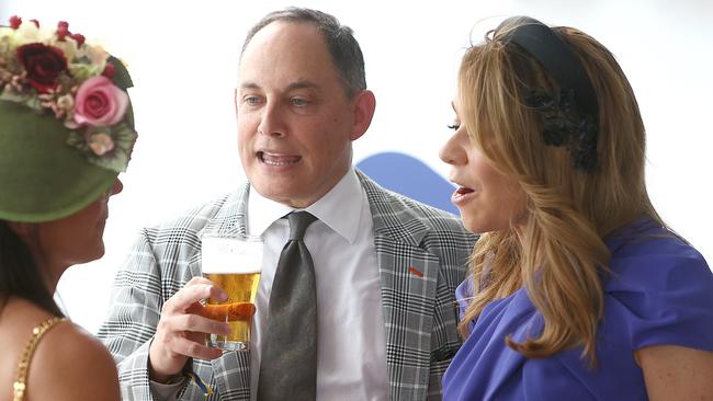 Raphael Geminder with wife Fiona Geminder at Flemington.