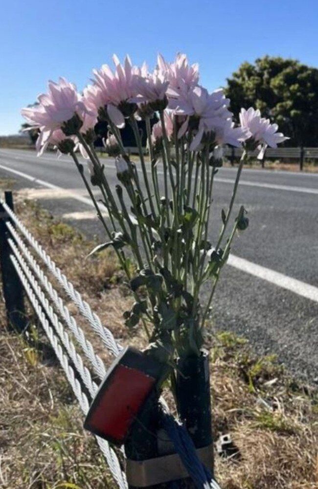 Flowers were left at the scene of the fatal crash for the 33-year-old Narooma man who died. Picture: Tom McGann.