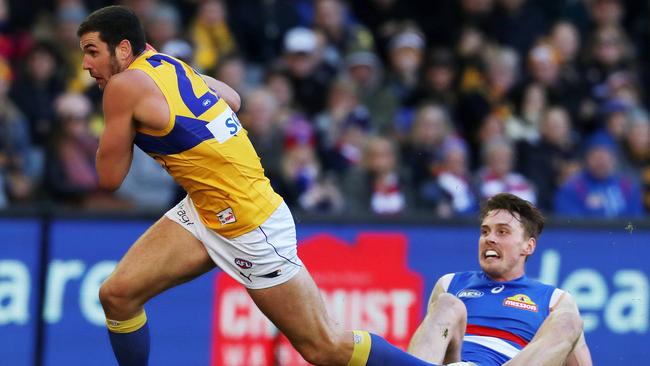 West Coast's Jack Darling runs away from Western Bulldogs’ Jordan Roughead. Picture: Michael Klein