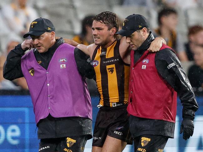 Nick Watson is carried from the field with an ankle injury. Picture: Dylan Burns/AFL Photos via Getty Images