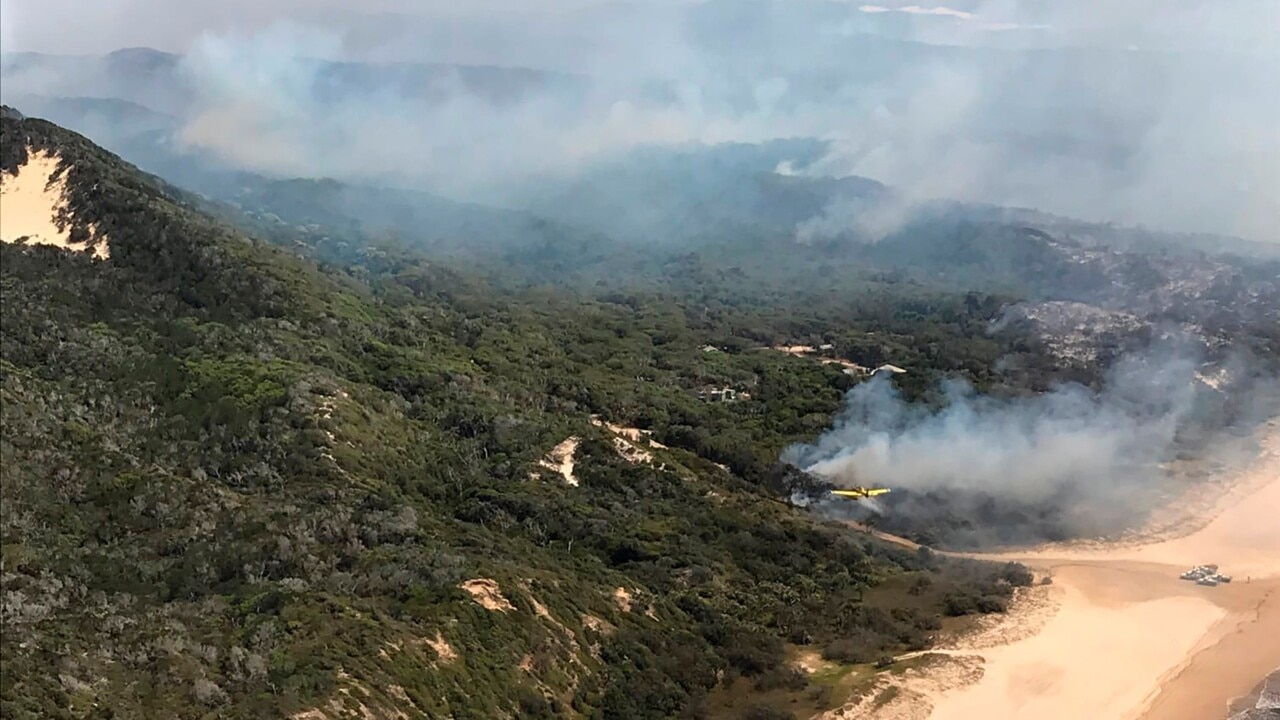 Five people charged over Fraser Island megafire