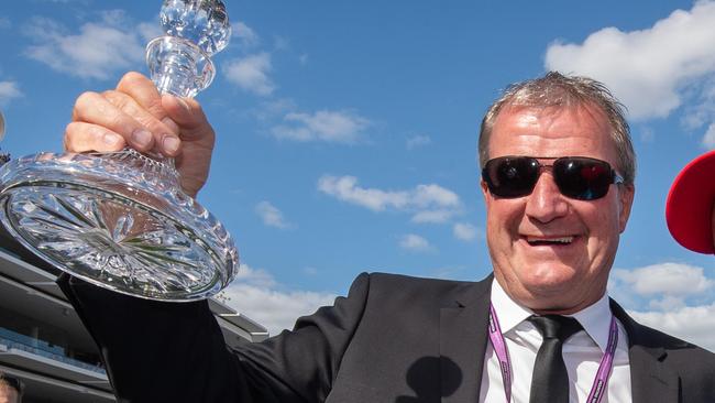 Darren Weir with his trophy after Extra Brut won the Victoria Derby. Picture Jay Town