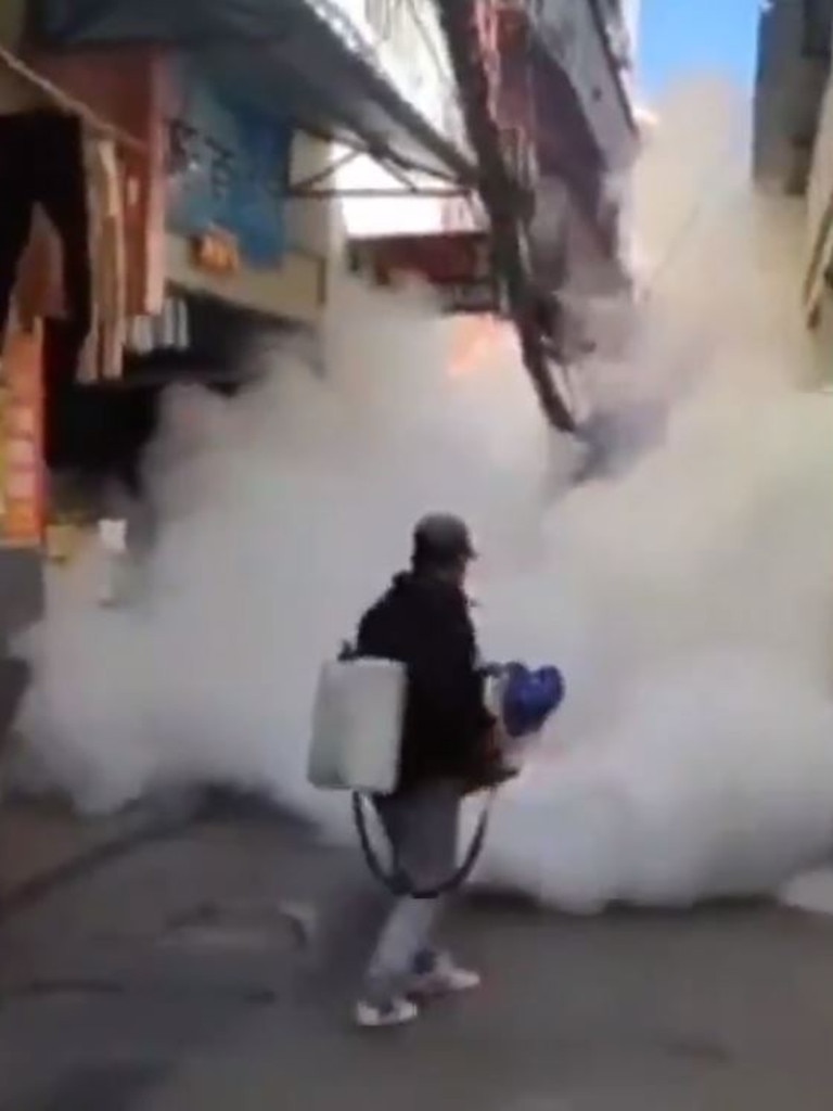 Coronavirus: China streets coated in disinfectant spray to halt ...