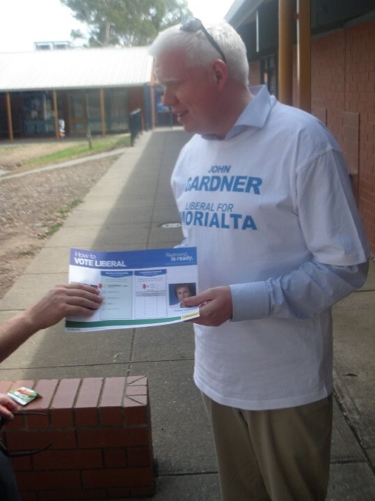 Gareth Ward hands out how-to-vote cards at South Australian 2010 election.