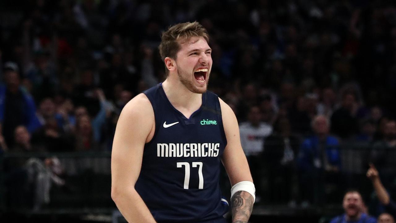 DALLAS, TEXAS - FEBRUARY 12: Luka Doncic #77 of the Dallas Mavericks reacts during play against the Sacramento Kings in the second half at American Airlines Center on February 12, 2020 in Dallas, Texas. NOTE TO USER: User expressly acknowledges and agrees that, by downloading and or using this photograph, User is consenting to the terms and conditions of the Getty Images License Agreement. Ronald Martinez/Getty Images/AFP == FOR NEWSPAPERS, INTERNET, TELCOS &amp; TELEVISION USE ONLY ==