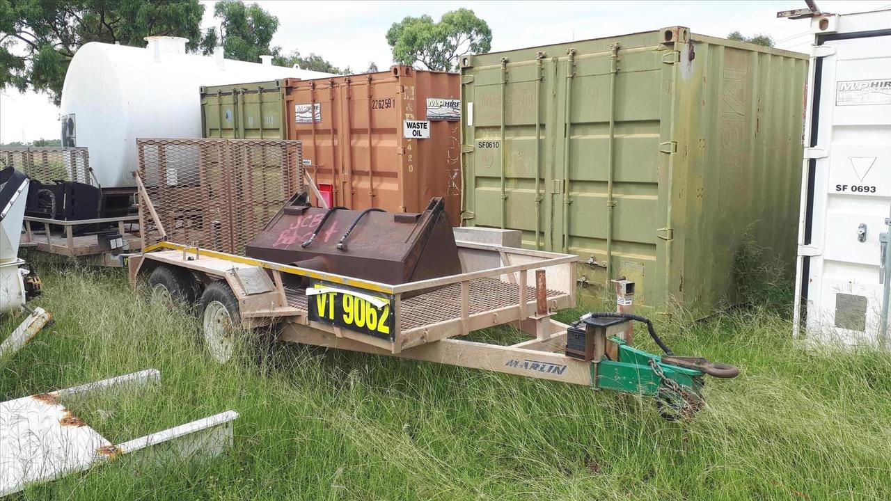 Image of the trailer and bucket stolen from Nebo. Picture: Queensland Police Service