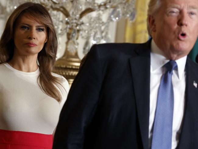 First lady Melania Trump listens as President Donald Trump speaks during a Hispanic Heritage Month event in the East Room of the White House, Friday, Oct. 6, 2017, in Washington. (AP Photo/Evan Vucci)