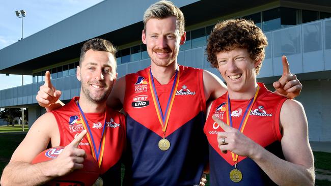 Lockleys players Liam Narcy, who kicked the winning goal for the A grade, Chad Hamilton from the B grade and Brad Broughton, who won best on ground for the A grade pictured last year. Narcy and Broughton were among a host of Demons premiership players who did not feature in the round one A grade side. Picture Mark Brake