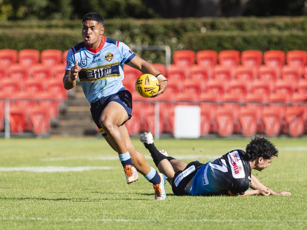 Hopoate Finau of Western Clydesdales gets away from Travis Cornthwaite of Northern Pride to score his second try of the match. Picture: Kevin Farmer.