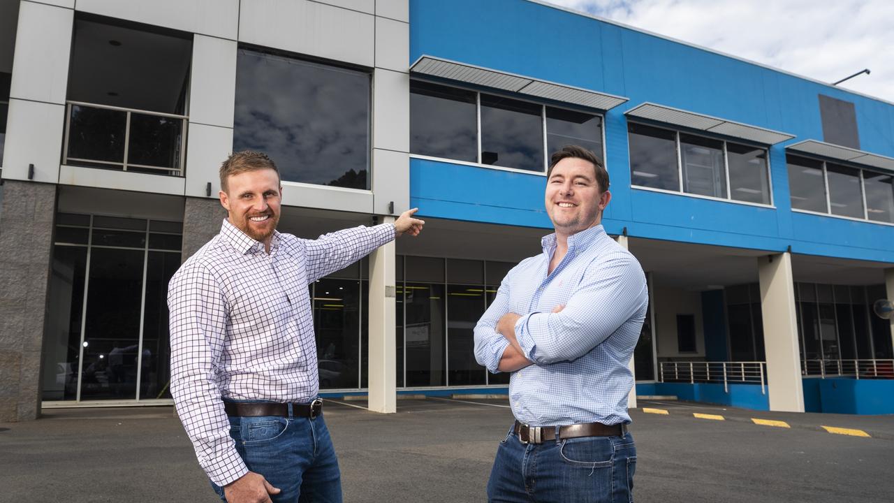 Hutchinson Builders team leader Sean Lees (left) with Cushman and Wakefield head of national investment sales Daniel Cullinane on site of the new Hutchinson Builders Toowoomba headquarters in Kitchener St, Friday, March 10, 2023. Picture: Kevin Farmer