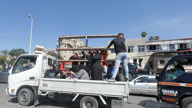 Civilians flee southern Lebanon after the Israeli military advised residents to evacuate, saying recent airstrikes would continue in the area. Picture: AFP