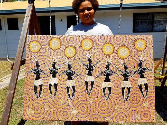 Juanella McKenzie with her work Artunyi (Seven Sisters Dance), acrylic, ochre and emu fat on canvas, 2018. Picture: Supplied