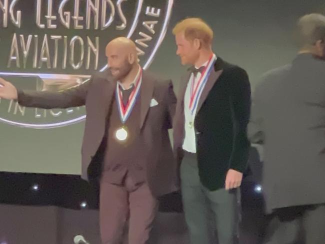 Prince Harry, The Duke of Sussex is inducted into the&#133;Living Legends of Aviation by John Travolta. Picture: Sandy / BACKGRID