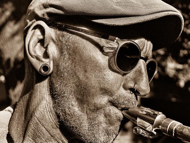 Saxophonist 'Saxter James' wowing the Bondi locals. Picture: Jonathan Armstrong