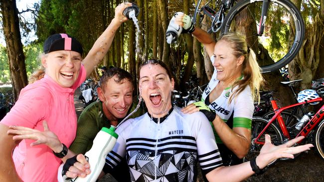 TOUR DOWN UNDER STAGE 2 - Unley to Stirling. STIRLING. (centre) Sam Flockhart (0413331280) gets a cooling off from cycling friends Jen Matthies (0439801070), Brian Saunders, Olesya Badish at Stirling Oval.  Pic: : Tricia Watkinson