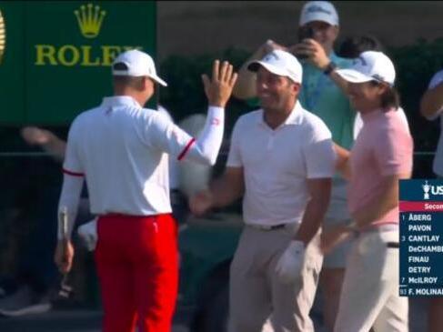 Molinari sinks hole-in-one to qualify!