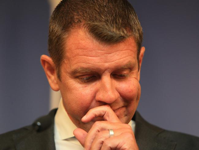 An emotional Mike Baird announces his retirement at a press conference yesterday. Picture: Mark Evans