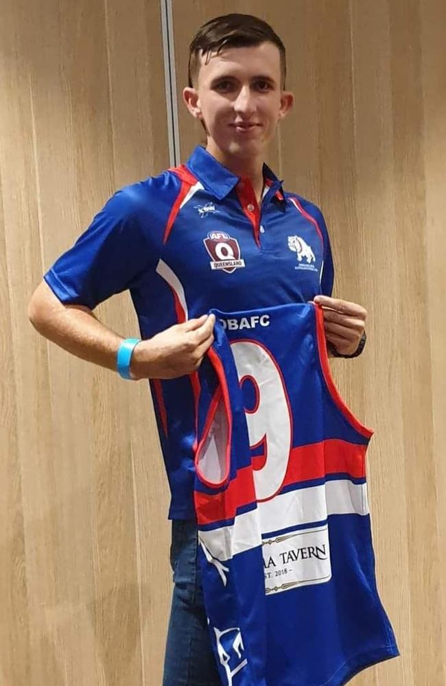 Gold Coast man Nicholas Hunter, 23, with his Bulldogs jersey.