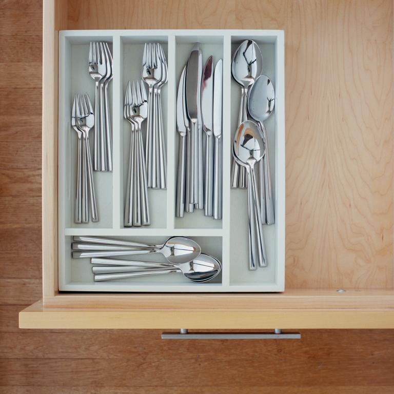 Most argued that you should store your cutlery in the order you set it out on the table and keep teaspoons underneath. Picture: Getty