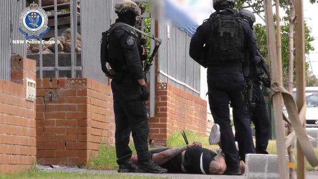 One of the two men moments after being arrested in Unanderra. Picture: NSW Police