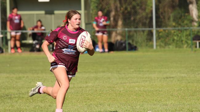 Lily-Rose Kolc carts the ball up. Pic: Colleen Edwards QRL