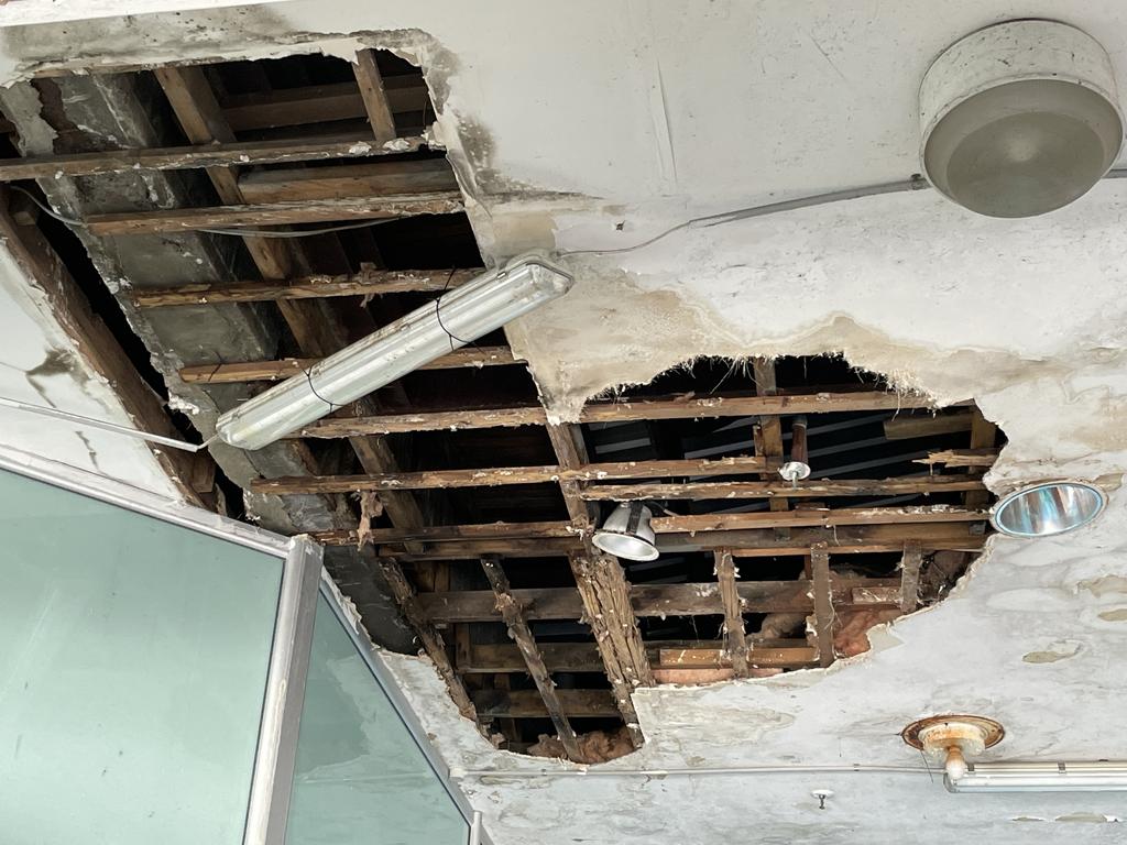 More of the ceiling has collapsed at the entrance of the former Dimmeys Arcade in the Townsville CBD. Picture: Leighton Smith.