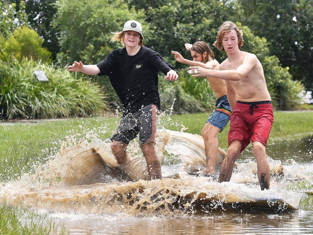 Youngsters making the most of the wet weather in Max Grady, Dylan Woods and Zane Luther at Muller Park, Bli Bli. Picture: Patrick Woods.